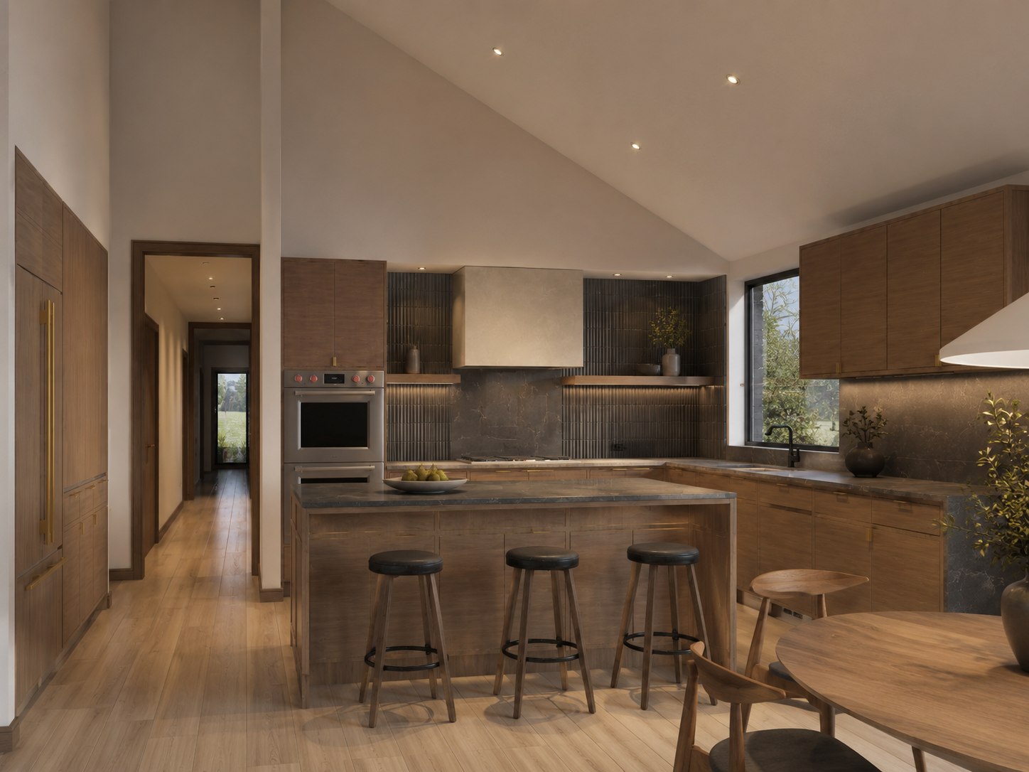 Deep Creek kitchen — vaulted ceiling, stone island, fluted backsplash, walnut casework